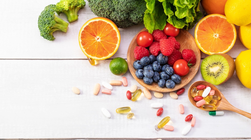 top-view-fresh-fruits-vegetables-with-different-medicine-wooden-spoon